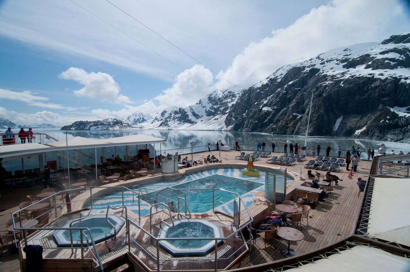 Cruise ship pool deck with Alaska glacier views
